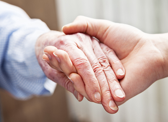 Two people holding hands